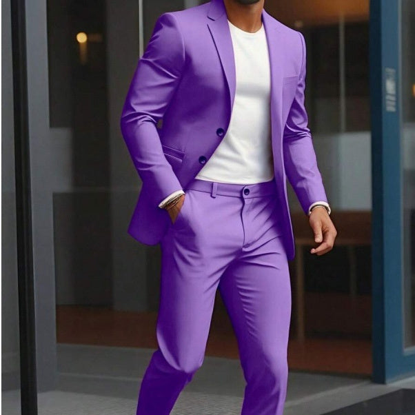Person wearing a purple suit with a white shirt in an indoor setting
