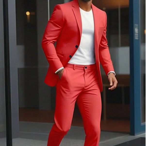 Person wearing a red suit with a white shirt in an urban setting