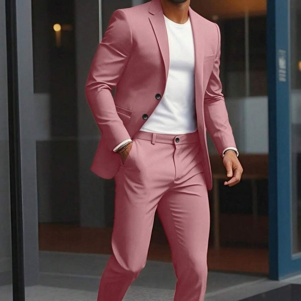 Person wearing a pink suit with a white shirt in an urban setting
